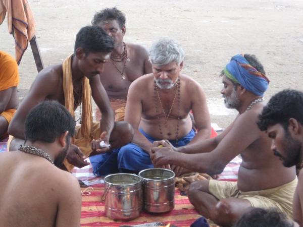 articles to be filled in the two compartment bag to be carried on head by the sabarimala pilgrims