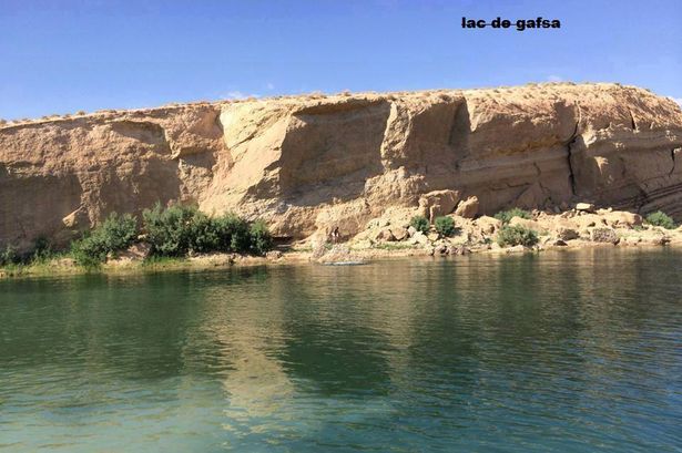 Miracle lake appears in the desert area of Tu