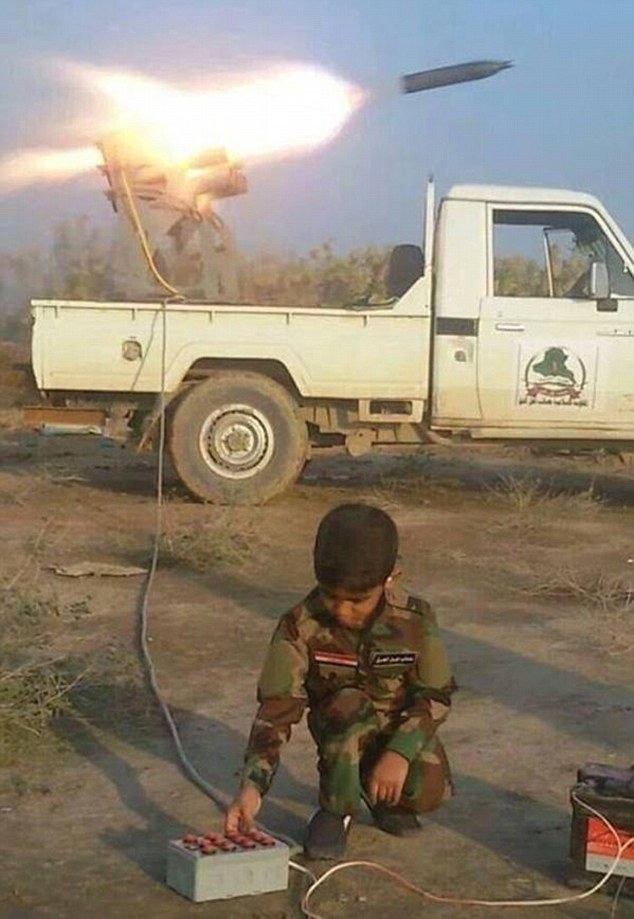 child-aged-under-ten-is-being-used-to-fire-rockets-by-the-militant-groups-in-iraq-syria
