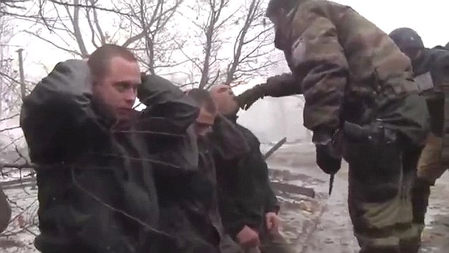 pro-russian-rebels-force-ukrainian-soldiers-eat-their-own-uniforms