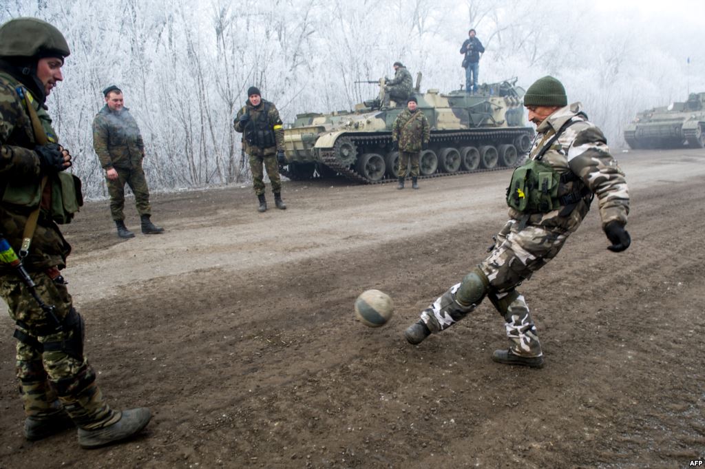 ukraine-servicemen-play-football-on-road-following-the-ceasefire-accord
