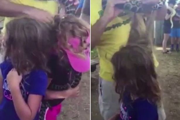 twin-girls-get-tangled-by-a-huge-python