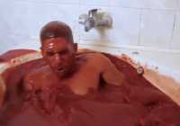 man-bathes-spicy-sauce