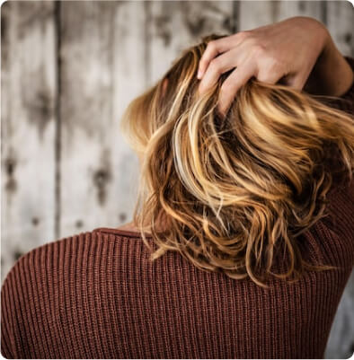 Try hibiscus infusions to fight dandruff naturally