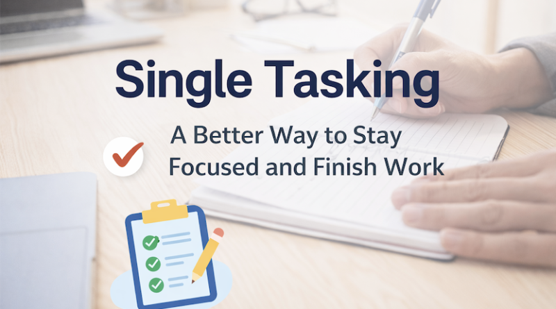 A person writing in a notebook at a desk, representing single tasking and focused work without distractions.